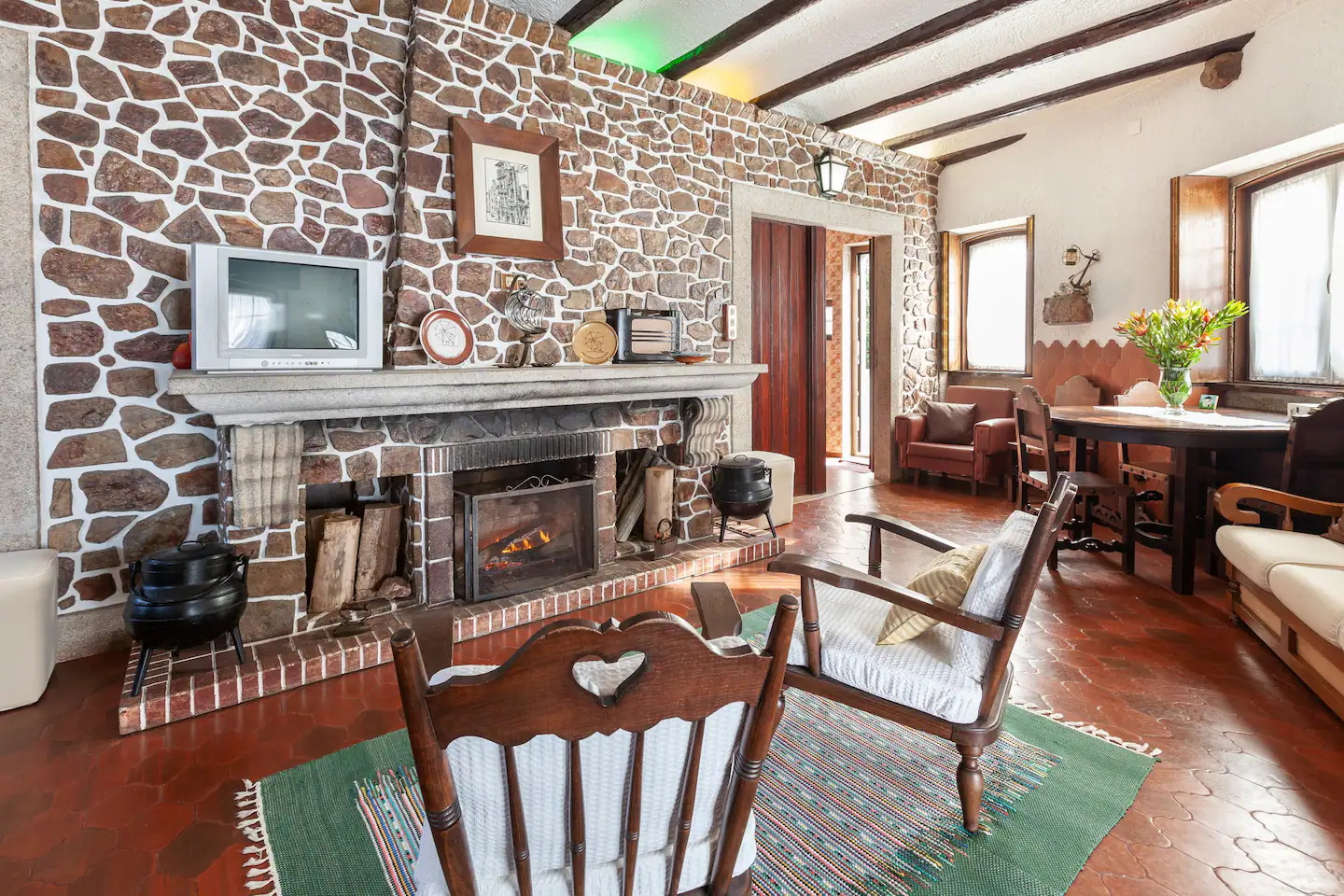 Stone fireplace and seating in the main living room