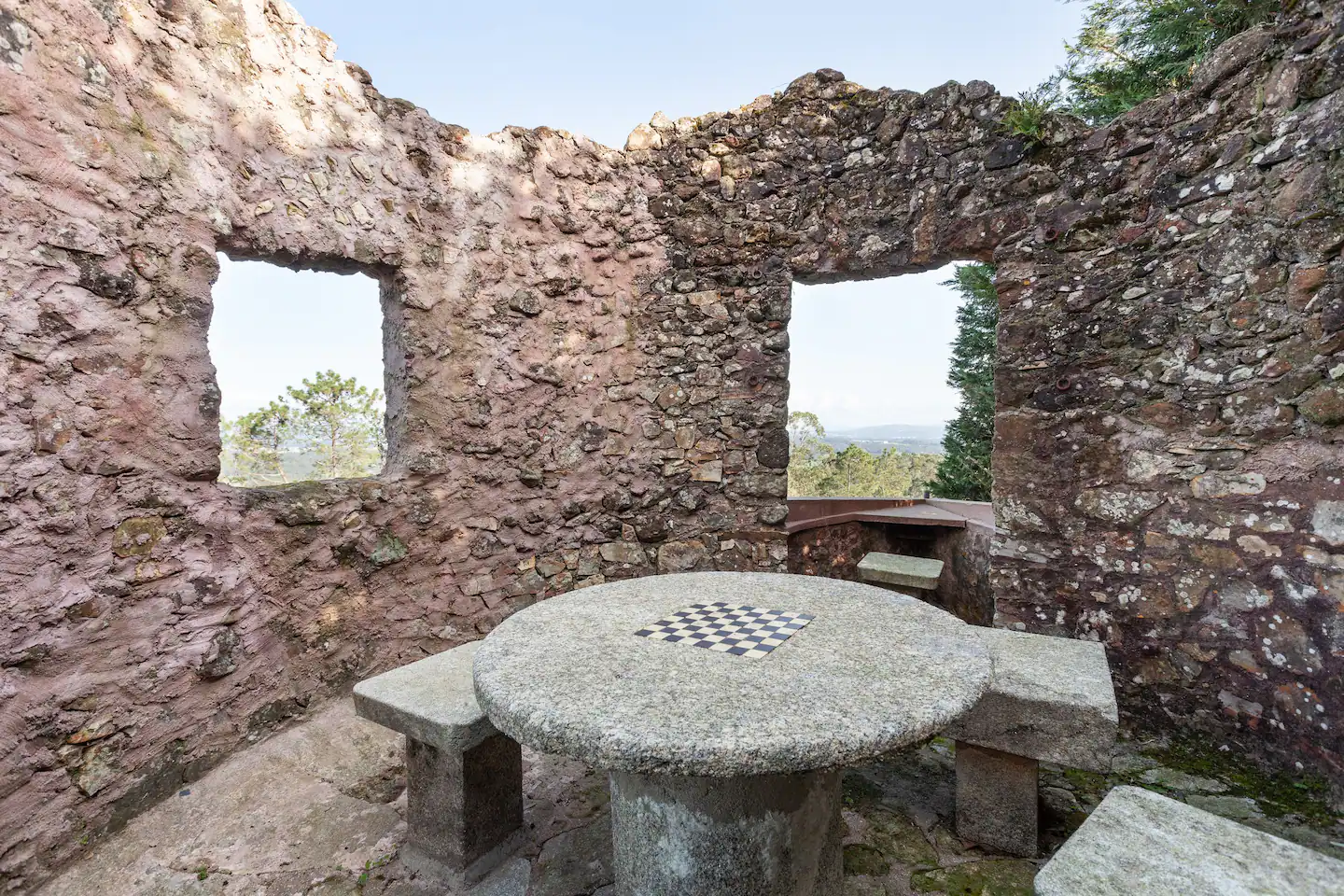 Sheltered stone table in the garden
